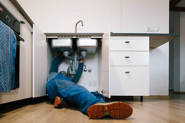 Professional Plumbing technician working in Fairfax Station, VA